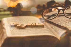 a book with a pair of glasses and a word on it